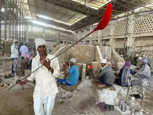 The traditional glass bangle industry in Firozabad, known as the 'City of Glass,' is facing severe challenges due to climate change. The ring temperatures exacerbate health risks for the five lakh workers employed in the Rs 1,000 crore industry. Workers endure extreme heat in poorly ventilated workshops, leading to heat-related illnesses, dehydration, and hospitalisations. There is an urgent need for support and interventions to protect their health and livelihoods.