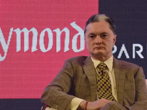 Raymond reappoints Gautam Hari Singhania despite recommendations against, prompting an independent investigation. The National Company Law Tribunal approves corporate restructuring. Q4 sees a significant 18% profit increase to Rs 229 crore.