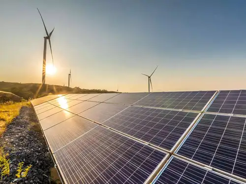 JSW Energy's arm, JSW Neo Energy, won a 200 MW wind-solar hybrid power project from the Maharashtra State Electricity Distribution Company. This increases their locked-in generation capacity to 17.2 GW. The company aims for an installed capacity of 20 GW and 40 GWh of energy storage by 2030. JSW Energy plans to achieve carbon neutrality by 2050.