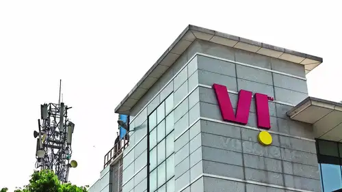 Vodafone Idea (Vi) has settled its ₹700 crore statutory dues for the April-June quarter, marking the first time in over two years the telecom operator has met its obligations on time. The payment includes licence fees and spectrum charges, a significant improvement from past partial repayments. Boosted by recent equity funding, Vi's cash reserves rose to ₹18,150 crore as of June 30. The company is in discussions with banks to secure up to ₹25,000 crore in debt and has begun securing network deals for 5G and 4G upgrades.