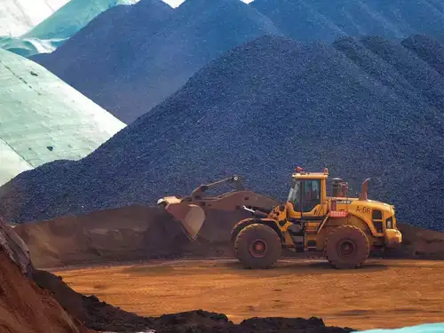 NMDC, India's largest iron ore miner, is exploring mining opportunities for critical minerals like lithium in Australia. The company aims to nearly double its production capacity to 100 million tonnes by 2030. Key initiatives include advanced slurry pipelines and beneficiation plants, focusing on sustainable growth and reducing environmental impact.