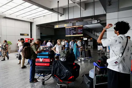 IndiGo and SpiceJet have warned passengers that flight schedules may be disrupted due to heavy rains in Delhi. The weather department has forecast more showers, and one flight from Bagdogra to Delhi was diverted to Lucknow. Passengers are advised to check their flight status and plan their journey to the airport carefully as roads may be waterlogged.