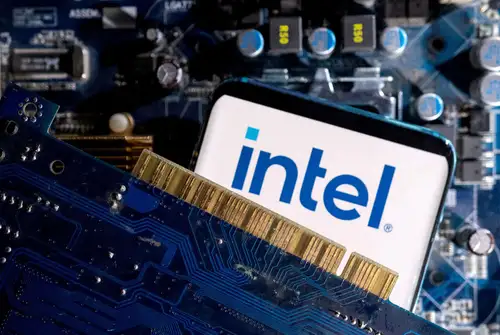 Intel's foundry business has secured Amazon's AWS as a customer for custom AI chips, boosting Intel's shares by 8%. The deal involves Intel producing an 'artificial intelligence fabric chip' using its advanced 18A process. Intel is also planning cost cuts and restructuring to improve efficiency and profitability.