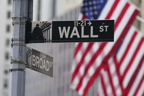 Wall Street's main indexes opened higher with the benchmark S&amp;P 500 close to its intraday record high, ahead of the Federal Reserve's policy meeting starting on Tuesday, after data signaling a healthy consumer allayed worries of a sharp slowdown in the U.S. economy.