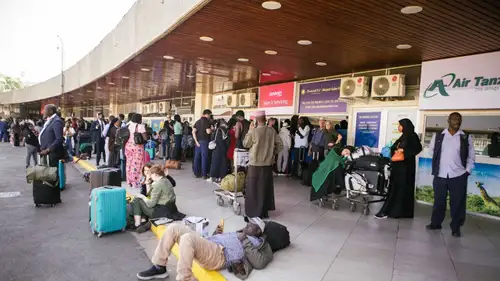 Hundreds of workers at Nairobi's main airport protested against a government deal with India's Adani Group. The strike caused flight delays and cancellations, as workers feared job losses and worse conditions. A High Court has temporarily halted the deal pending a legal review.