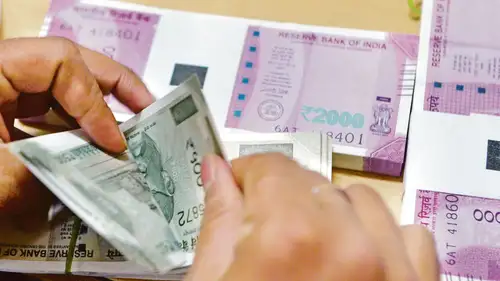 INR vs USD: Why is Indian rupee falling despite dropping US dollar rates?